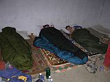 Tibet Kailash 11 Back 10 Shishapangma Checkpoint Room Inside We had initially wanted to camp next to the Shishapangma Checkpoint Guesthouse, but the water wasn�t trustworthy. So we stayed at the Guesthouse � here is our basic room with mattresses on the floor.